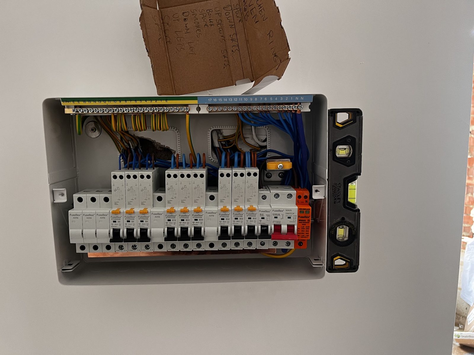 A new consumer unit being fitted, cover off